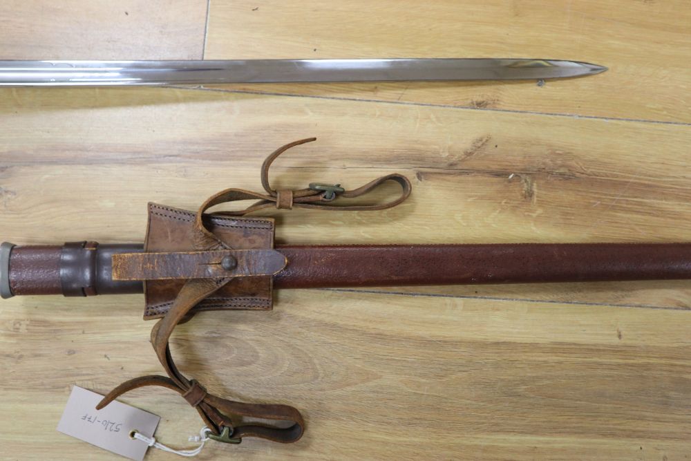 A 1912 Pattern Cavalry sword ER II, shagreen grip and 94cm etched, single edged blade, leather scabbard